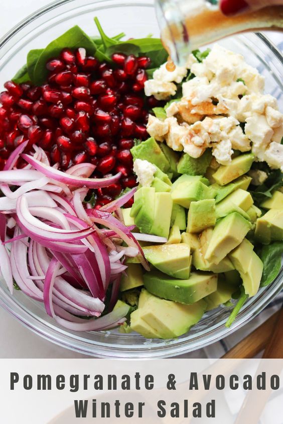 Pinterest graphic with the finished dish and text "Pomegranate and Avocado Winter Salad"