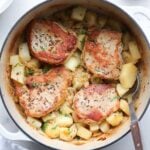 Finished Dish in a dutch oven with a large serving spoon.