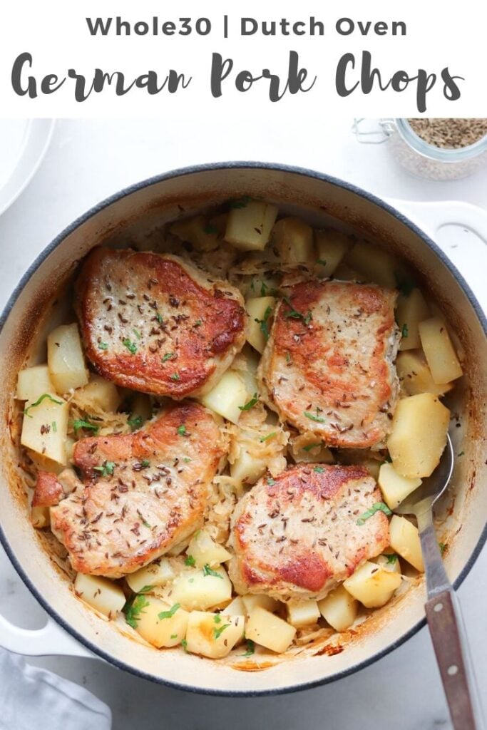 Close up of finished dish in the dutch oven with the text "Whole30, Dutch Oven German Pork Chops" for Pinterest