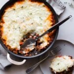 Cottage Pie on a white platter with a serving spoon.