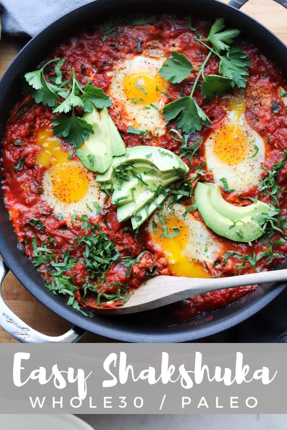 Pinterest graphic with a close up photo of the finished dish and the text "Easy Shakshuka, Whole30/Paleo"