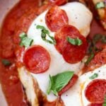 Keto pizza chicken with sauce and pepperoni.