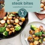 A skillet and two plates with steak bites, roasted potatoes, and broccoli. Text overlay reads: "garlic steak bites cookathomemom.com." Enjoy with a sweet treat like strawberry Cheesecake fat bombs for dessert!.