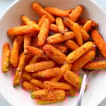 Roasted Baby Carrots in a white bowl.