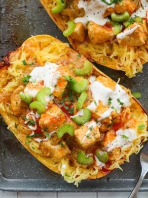 Close up of one buffalo chicken stuffed spaghetti squash boat.