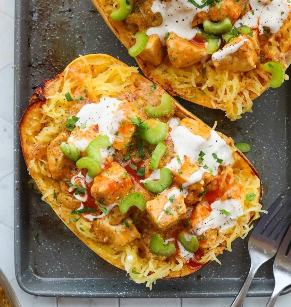 Close up of one buffalo chicken stuffed spaghetti squash boat.