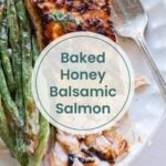 Grilled salmon with honey balsamic glaze on a plate, served alongside green beans and a fork. Text overlay reads "Baked Honey Balsamic Salmon with hints of pork chop marinade" and footer says "Cook at Home Mom.