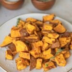 Air fryer sweet potatoes with herbs.