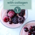 Two glasses of pink berry smoothie with collagen, topped with assorted frozen berries, viewed from above, feature a label reading "berry smoothie with collagen.