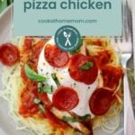 A pizza chicken breast topped with tomato sauce, melted cheese, and pepperoni slices served over shredded spaghetti squash, garnished with basil. A label reads "pizza chicken cookathomemom.com." Perfect for keto pizza lovers!.