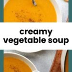 Two bowls of creamy orange vegetable soup with a spoon, garnished with black pepper, next to some crackers on a light surface.