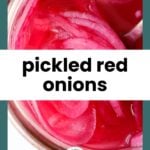 Close-up view of sliced pickled red onions in a jar with a spoon, shown against a pink liquid brine.