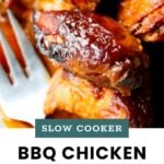 Close-up of saucy BBQ chicken thighs with a fork beside them; text overlay reads "Slow Cooker BBQ Chicken Thighs, cookathomemom.