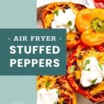 Close-up of colorful stuffed bell peppers topped with melted cheese and sour cream, served on a white plate with small bowls of sauce on the side. Text overlay reads "Air Fryer Stuffed Peppers.