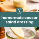 Glass jar filled with creamy Caesar salad dressing, surrounded by salad ingredients, a cutting board, and a salad bowl in the background. Text overlay reads "homemade caesar salad dressing.