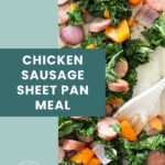 A sheet pan with sliced chicken sausage, kale, red onion, and roasted sweet potato chunks, with a wooden spoon mixing the ingredients.