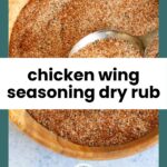 A metal spoon rests in a wooden bowl filled with a reddish-brown chicken wing seasoning dry rub.