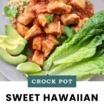 Plate of Crock Pot sweet Hawaiian chicken with sauce, served with cauliflower rice, lettuce leaves, sliced avocado, lime wedges, and garnished with cilantro.