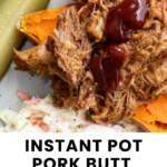 Close-up of pulled pork with barbecue sauce on a sweet potato, served with pickles and coleslaw on a white plate.